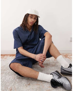 Reclaimed Vintage oversized chambray denim shirt in mid blue co ord
