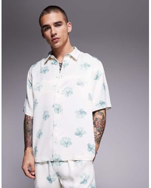 ASOS DESIGN relaxed shirt with floral print in neutral