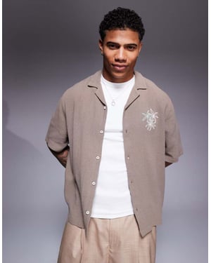 ASOS DESIGN boxy revere shirt with chest embroidery in green