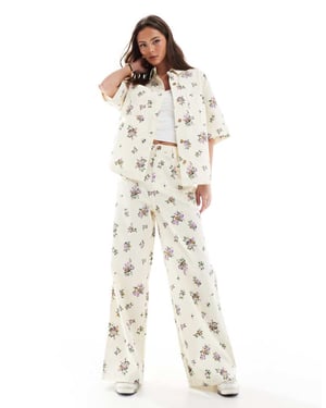 ASOS DESIGN hög midja vida byxor i blommönster