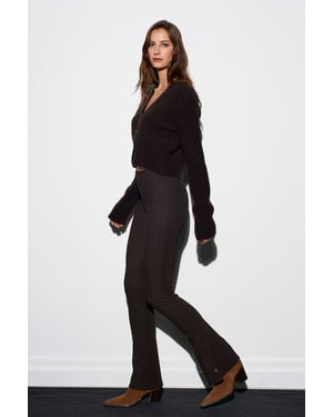 Hög midja flare leggings med knapppdetailj