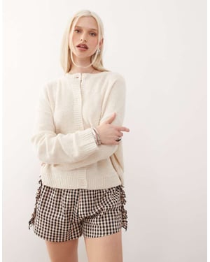 Reclaimed Vintage boxy cardigan in cream