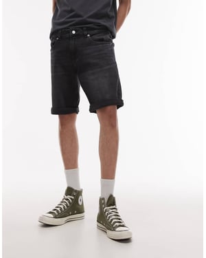Tommy Jeans Ronnie uppvikt slim denim shorts i svart