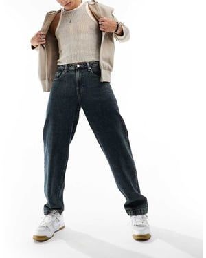 ASOS DESIGN baggy jeans i vintagefärg