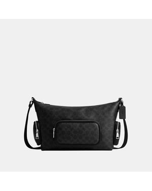 Finn Crossbody Bag With Pockets In Signature Canvas