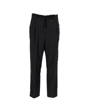 Saint Laurent – ​​Avsmalnande joggingbyxor med dragsko i svart ull