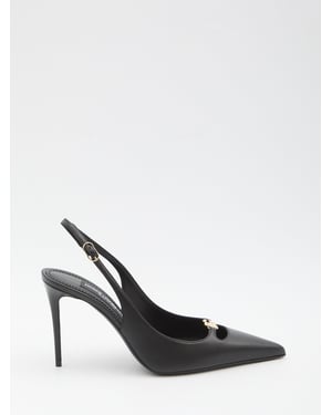 Slingback-pumpar i silkenappa