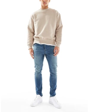 French Connection smal passform jeans i mid blue