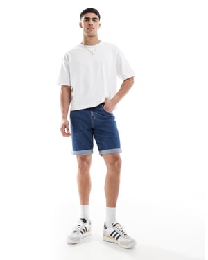 ASOS DESIGN slim stretch denim shorts i mellanblå tvätt