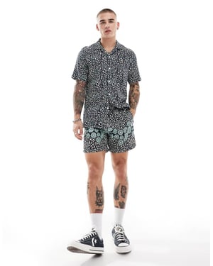 Farah colbert koord blommönstrad badshorts i marinblå
