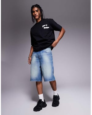 ASOS DESIGN längre carpenter denim shorts i medelblå tvätt