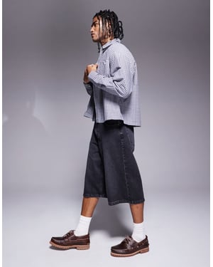 ASOS DESIGN längre denimshorts i tvättad svart