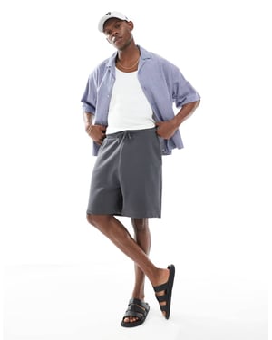 ASOS DESIGN essentials mid length oversized shorts i kolafärg