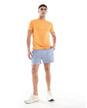 New Balance essentials 5-tum shorts i blått