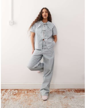 Återvunnen vintage baggy bred ben jeansko-ord i ljusblårandig