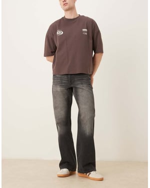 ASOS DESIGN vida flare jeans i vintage tvättad svart