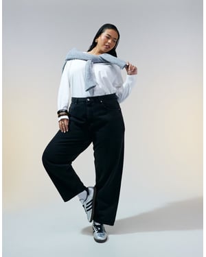 ASOS DESIGN Curve byxorna med trompetben i tvättad svart