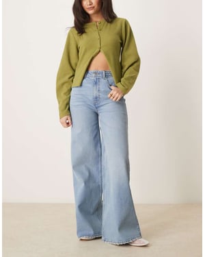 ASOS DESIGN bredbent jeans med flätad midja i mellanutfärgning