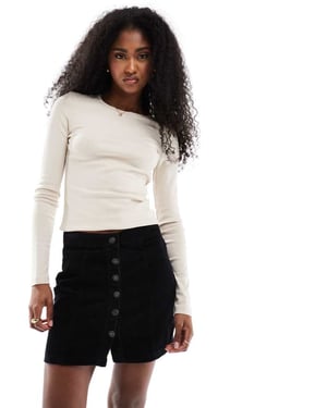 DTT Jordan cord button front mini skirt in black