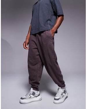 ASOS DESIGN oversized joggers i tvättad mörkbrun