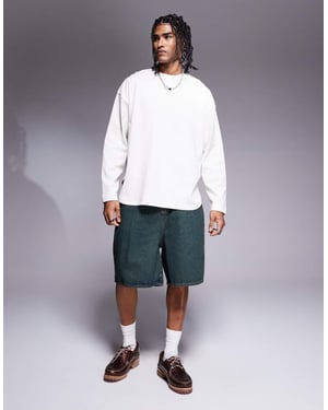 ASOS DESIGN längre denimshorts med grön nyans