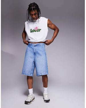 ASOS DESIGN långlängds denimshorts i ljus tvättad blå