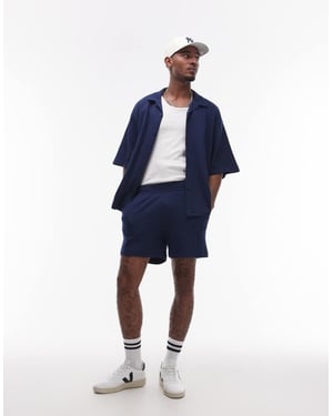 Topman oversized passform våfflade shorts i marinblå
