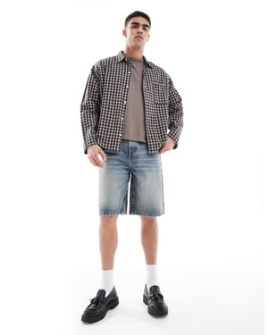ASOS DESIGN längre denimjorts i ljus tvättad blå med ton