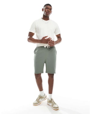 ASOS DESIGN överdimensionerad våfflat texturerad shorts i grön