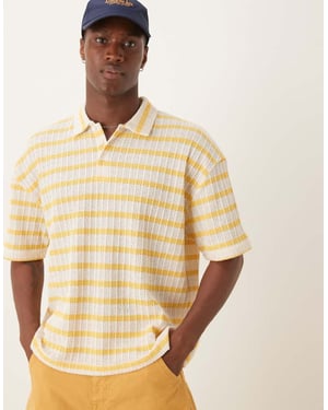 ASOS DESIGN boxig oversized polo i strukturerad vit och gul rand
