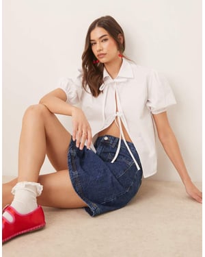ASOS DESIGN blus med knytning framtill och puffärmar i vitt