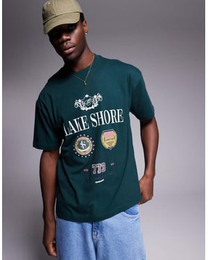 ASOS DESIGN oversized t-shirt med varsitygrafik i mörkgrön
