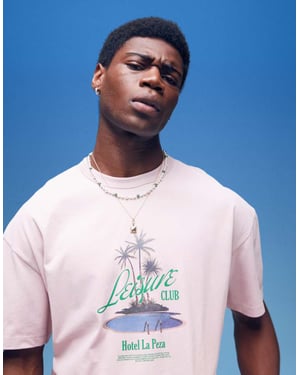 ASOS DESIGN tung boxy oversized t-shirt med palmträdstryck på bröstet i tvättad rosa