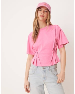 ASOS DESIGN kortärmad korsett-t-shirt med sömnadsdetaljer i tvättad rosa