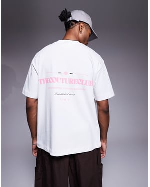 Couture Club oversized t-shirt i vitt med rosa tryck på bröstet och ryggen