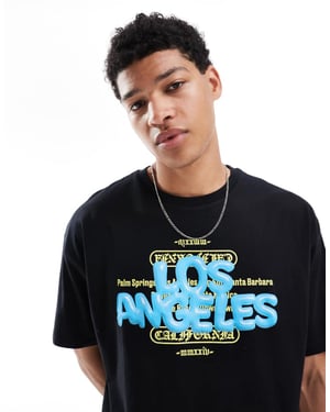 ASOS DESIGN oversized t-shirt med stadsgrafik framtill i svart