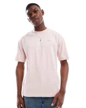 Hollister ikon tvättad boxy oversized t-shirt i ljusrosa