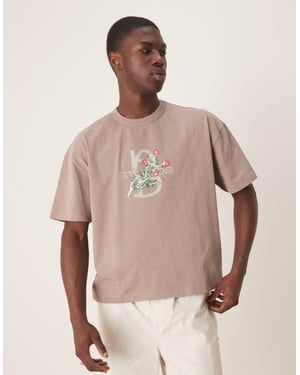 ASOS DESIGN tung boxy oversized t-shirt i tvättad sten med blommig textgrafik
