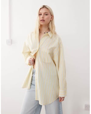 COLLUSION oversized poplin-skjorta i smörkräm gulrandig
