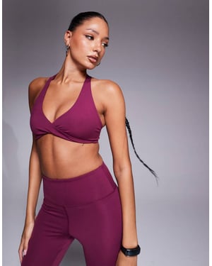 4505 soft touch light support twist front sports bra mulberry