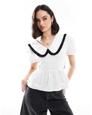 ASOS DESIGN skjorta med knyt bakom och volangkrage i vitt och svart