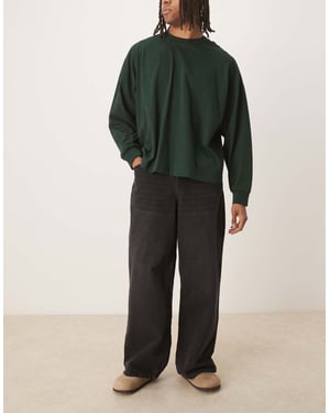ASOS DESIGN lösa plisserade jeans i tvättad svart