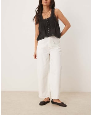 ASOS DESIGN denimbyxor med bågben i ecru