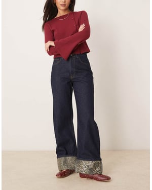 ASOS DESIGN leopardmönstrad uppvikt jeans i indigo