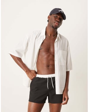 Free Society contrast trim swim short in black and white