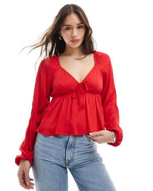 Pimkie tie front long sleeve peplum top in red