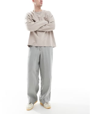 Cotton On baggy passform linnebyxor i tvättad militärgrön