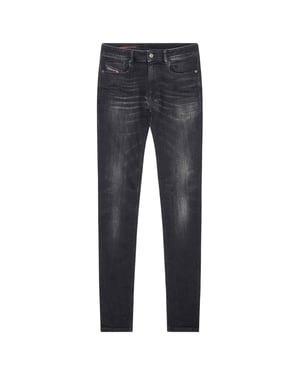 Diesel Sleenker Destroyed Reinforced Denim Black Skinny Jeans