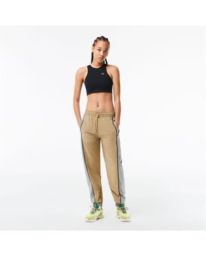 Lacoste Elastische, slim-fit trainingsbroek met kleurblokken voor dames (Cement)