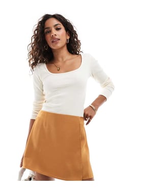 ASOS DESIGN Petite wrap satin skirt in gold